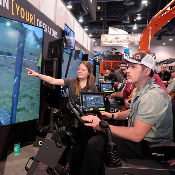 Attendee on construction simulator